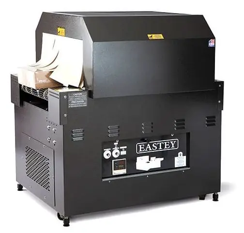 A black Eastey shrink tunnel with a conveyor and controls on the front panel.